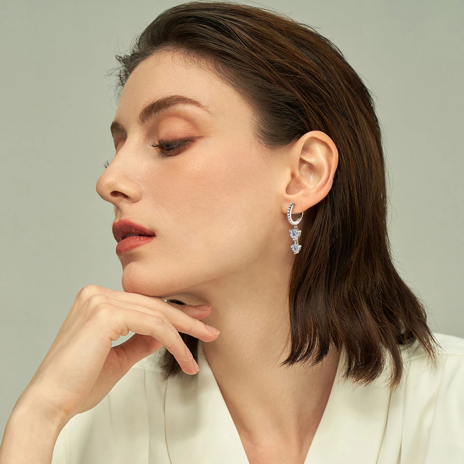 Model Wear Moissanite Drop Earrings in Gold Plated Silver_White White Gold