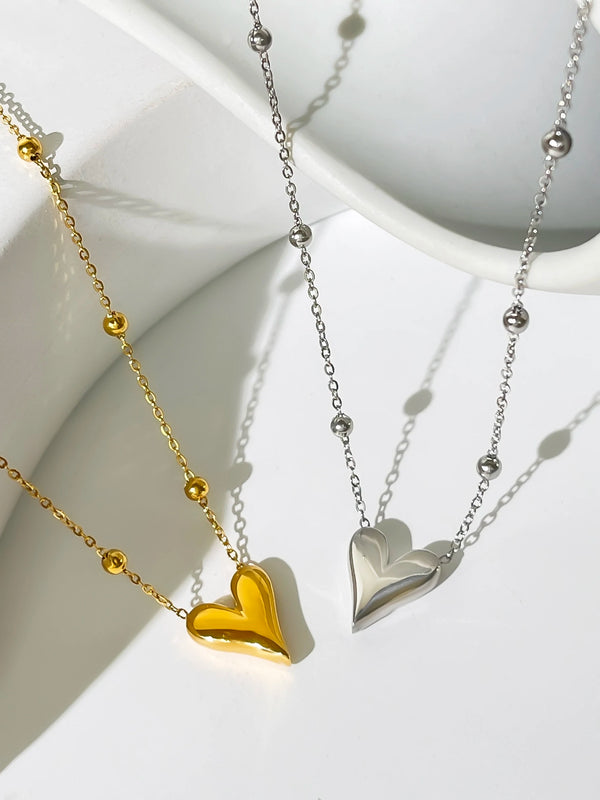 Two side by side Dainty Love Heart Bead Chain Necklace in 18K yellow and white Gold-Plated Stainless Steel options