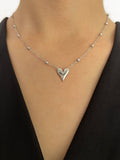 Model wearing Dainty Love Heart Bead Chain Necklace in 18K white Gold-Plated Stainless Steel