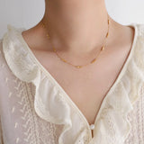 Model wearing  Elegant Gold Geometric Necklace