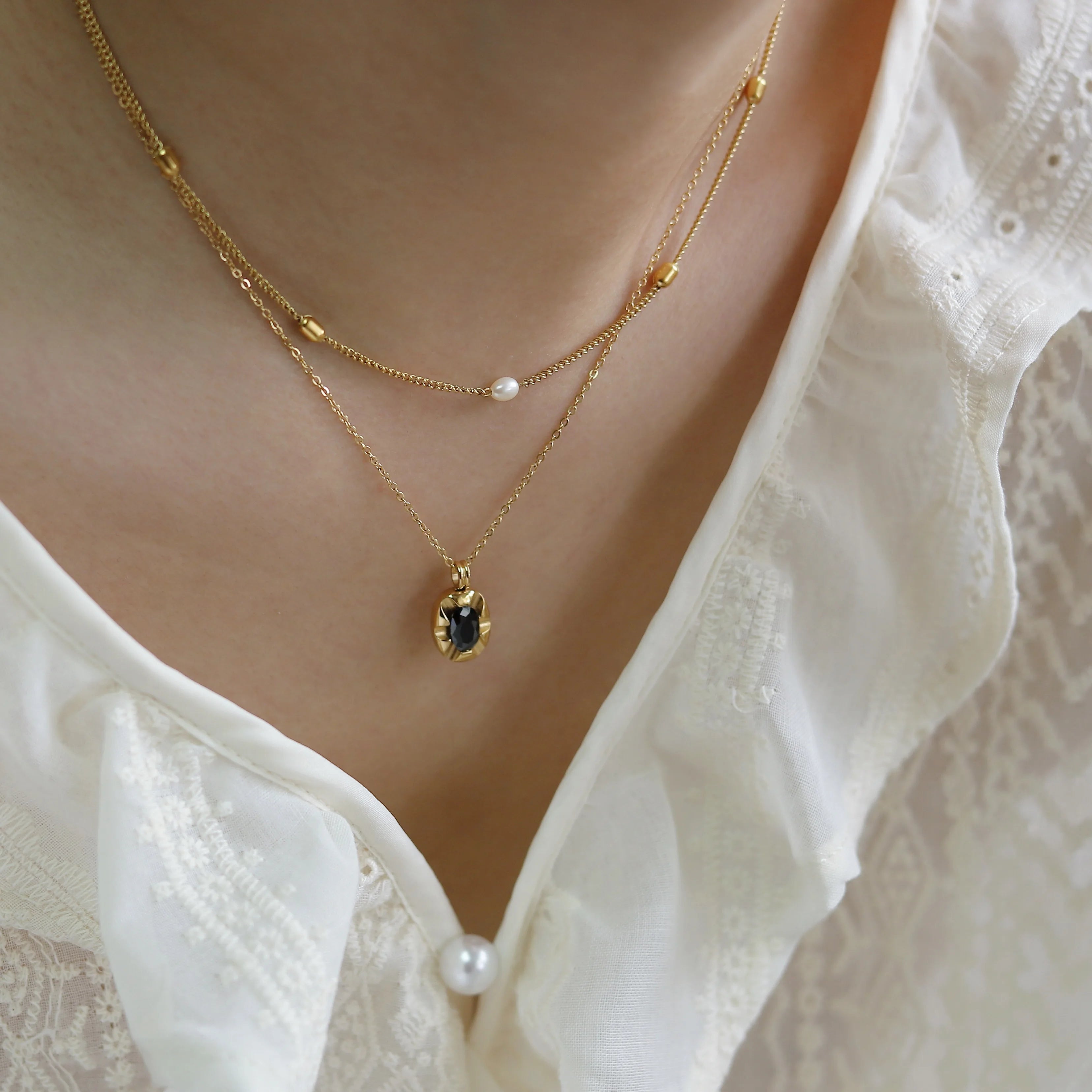 Model wearing Freshwater Pearl and Gold Bead Necklace