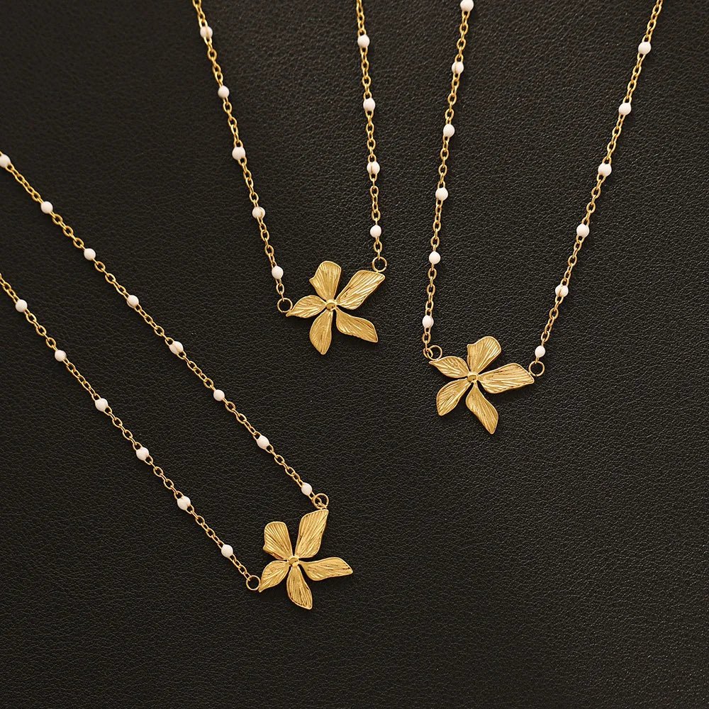 Waterproof Gold Petal Pendant Necklace with White Beads Premium 18K gold-plated stainless steel, white beads