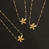 Waterproof Gold Petal Pendant Necklace with White Beads Premium 18K gold-plated stainless steel, white beads