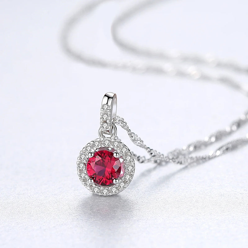 Sterling Silver Halo Pendant Necklace in Silver and red stone