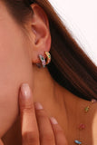 Model wearing LillyFleur Waterproof Colorful Zircon Hoop Earrings in Gold and Silver Color Options