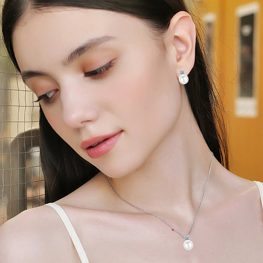 Model wearing Pearl & Moissanite Jewelry Set in 925 Sterling Silver