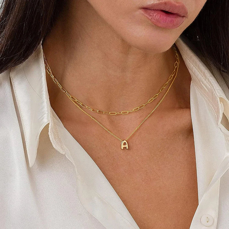 Model wearing 3D Bubble Initial Letter A in 18K Gold-Plated Stainless Steel - Boldly You