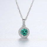 Halo Pendant Necklace in Sterling Silver and Green Stone