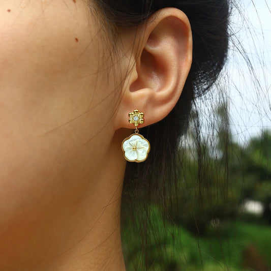 Model wearing Waterproof Pearl Shell Pansy Flower Earrings 18K - Gold Plated