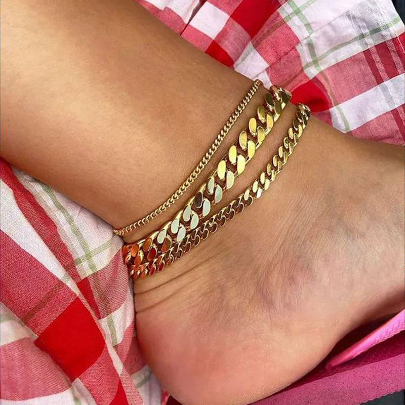 three_thicknesses_18K_Gold_Plated_Waterproof_Cuban_Chain_Anklet_on_a_model_foot 