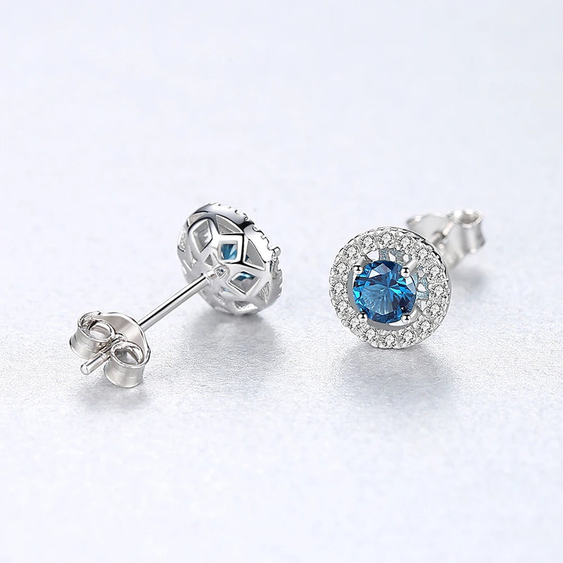 sterling silver halo blue stud earrings