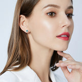 Round Stud Earrings in Sterling Silver and Green Stone