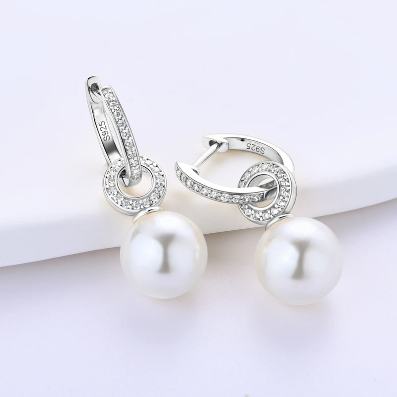 sterling silver pearl drop earrings with clear stones all over in white gold plating