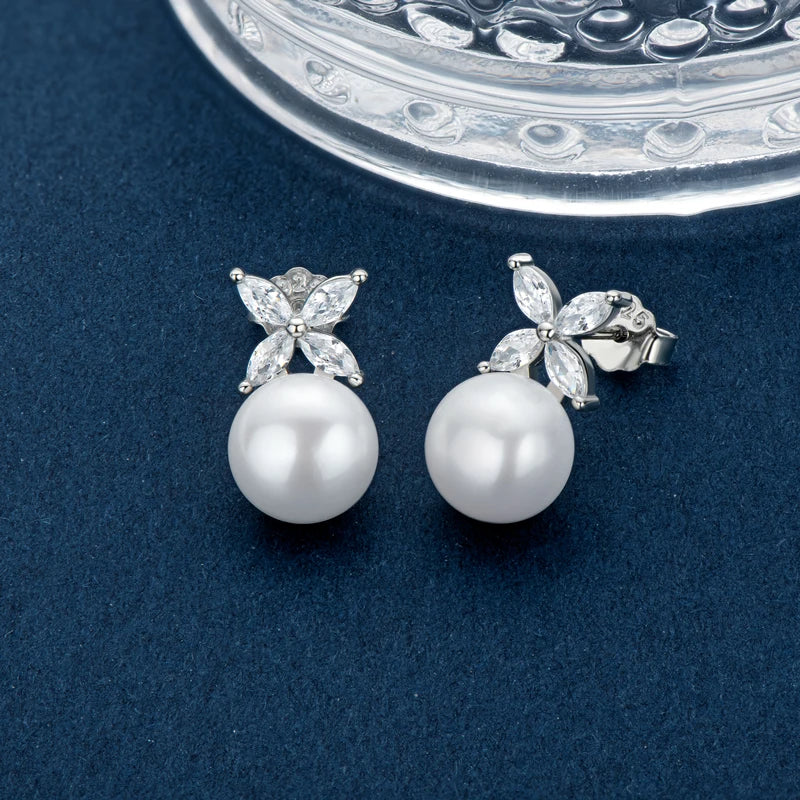 Pearl Stud Earrings in Silver with clear stone four leaf on top