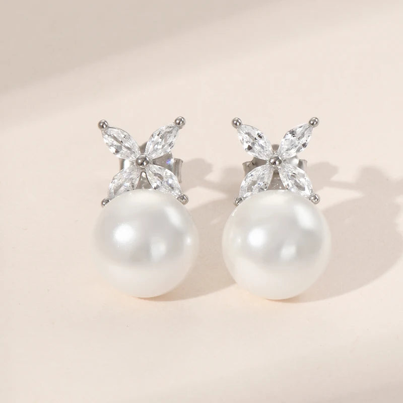 Pearl Stud Earrings in Silver with clear stone four leaf on top