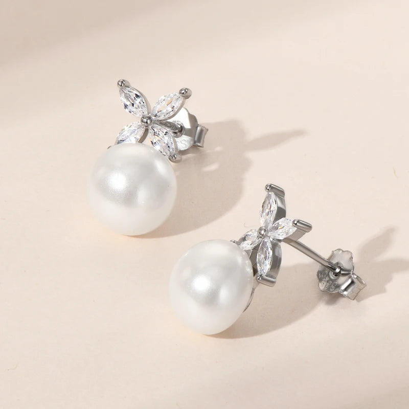 Pearl Stud Earrings in Silver with clear stone four leaf on top