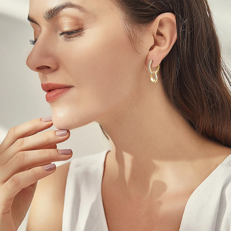 model wearing Moissanite Hoops Earrings in yellow Gold Plated Silver 